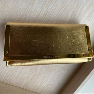 Tory Burch gold tone fold over sunglass case